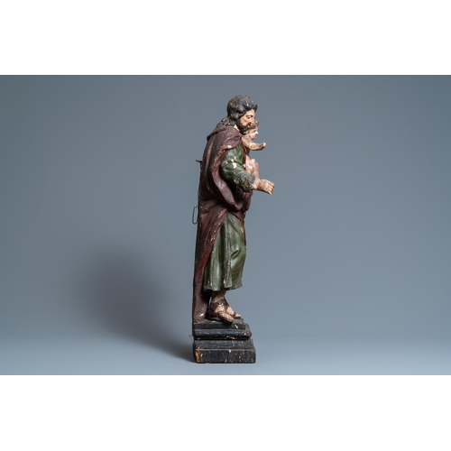 164 - A polychromed wooden figure of Saint Joseph with child, 2nd half 17th C.H.: 67 cm  Provenance: - The... 