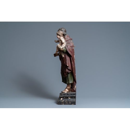 164 - A polychromed wooden figure of Saint Joseph with child, 2nd half 17th C.H.: 67 cm  Provenance: - The... 