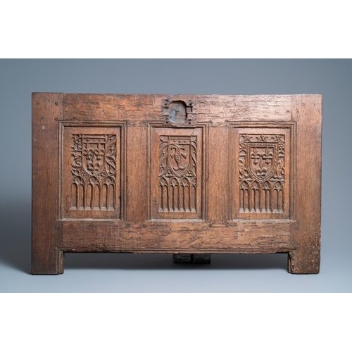 17 - A carved oak front panel of a coffer with the arms of France and the Dauphin, France, 2nd half 15th ... 