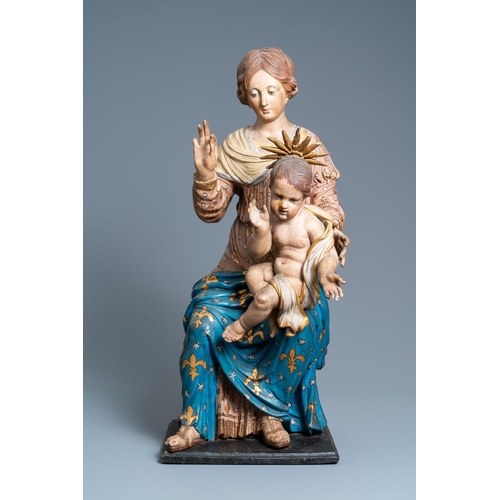 174 - A polychromed wooden figure of a Madonna with child, 17th C.H.: 88 cm (incl. stand)H.: 84,5 cm (the ... 