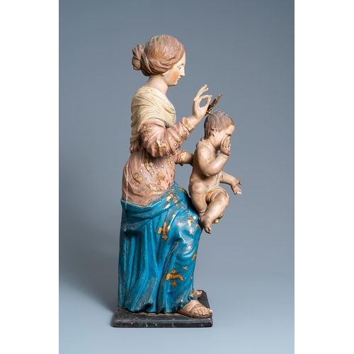 174 - A polychromed wooden figure of a Madonna with child, 17th C.H.: 88 cm (incl. stand)H.: 84,5 cm (the ... 