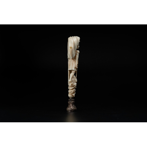 177 - An ivory and silver seal stamp with a hussar handle, 19th C.Lot subject to CITES-regulations. Availa... 