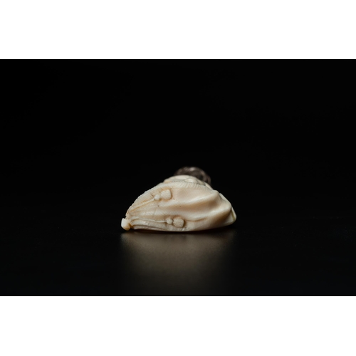 177 - An ivory and silver seal stamp with a hussar handle, 19th C.Lot subject to CITES-regulations. Availa... 