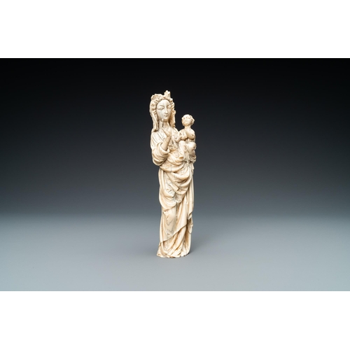 179 - An ivory figure of a Madonna with child, probably France, 19th C.Lot subject to CITES-regulations. A... 