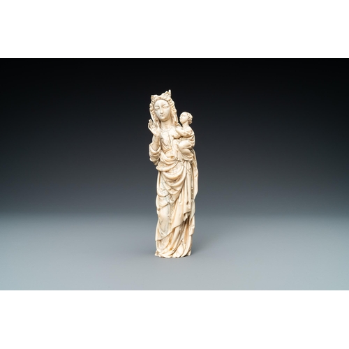 179 - An ivory figure of a Madonna with child, probably France, 19th C.Lot subject to CITES-regulations. A... 