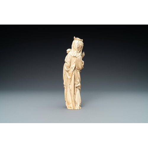 179 - An ivory figure of a Madonna with child, probably France, 19th C.Lot subject to CITES-regulations. A... 