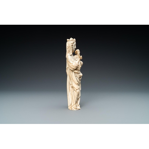 179 - An ivory figure of a Madonna with child, probably France, 19th C.Lot subject to CITES-regulations. A... 