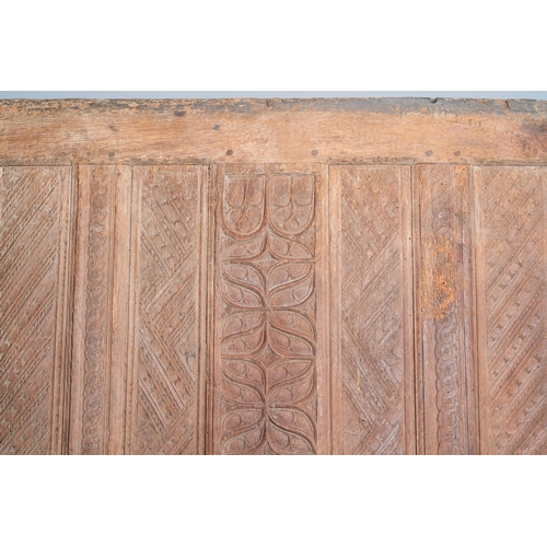 18 - A carved oak front panel of a coffer with tracery panels and geometrical motives, Brittany, France, ... 