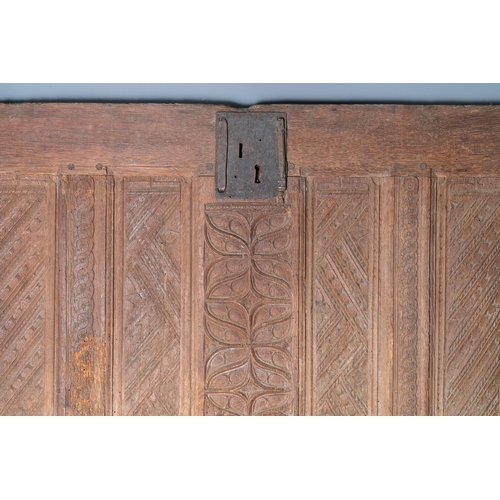 18 - A carved oak front panel of a coffer with tracery panels and geometrical motives, Brittany, France, ... 