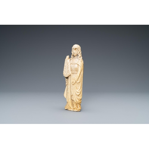 180 - An ivory figure of Saint Barbara, 19th C.Lot subject to CITES-regulations. Available for sale in the... 