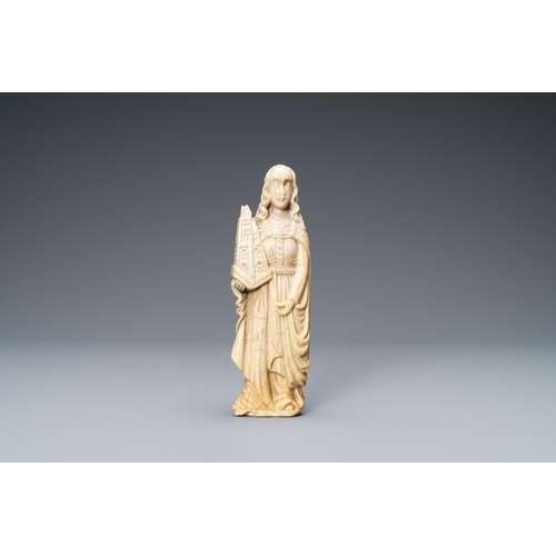 180 - An ivory figure of Saint Barbara, 19th C.Lot subject to CITES-regulations. Available for sale in the... 