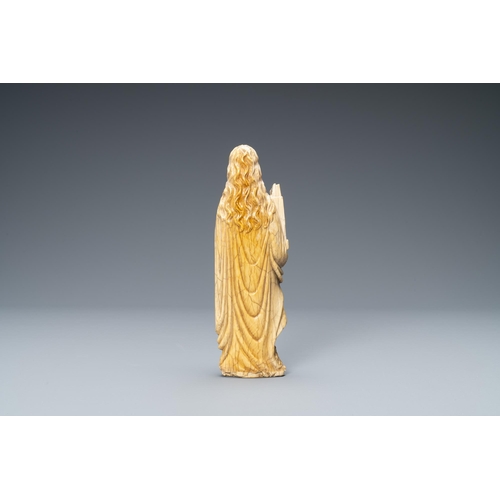 180 - An ivory figure of Saint Barbara, 19th C.Lot subject to CITES-regulations. Available for sale in the... 