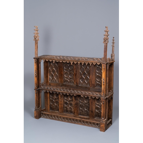 2 - A carved oak shelf with pinnacles and stylised flowers and carved panels, 15th C. and laterDim.: 149... 