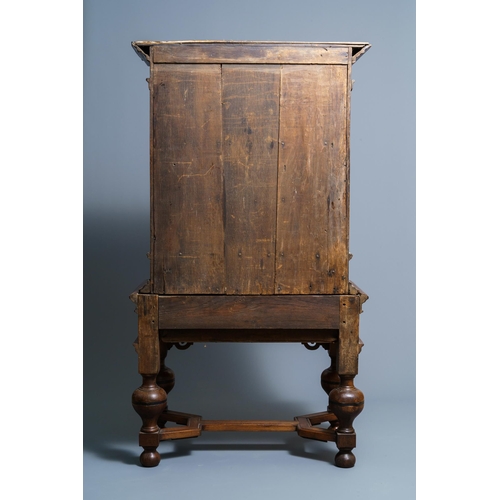 20 - An oak and ebony two-door cabinet, The Low Countries, 17th C.Dim.: 160,5 x 90 x 47 cm  Provenance: -... 