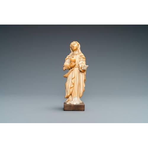 34 - An Indo-Portuguese ivory figure of Mary Magdalen with an ointment jar, probably Goa, 17/18th C.Lot s... 