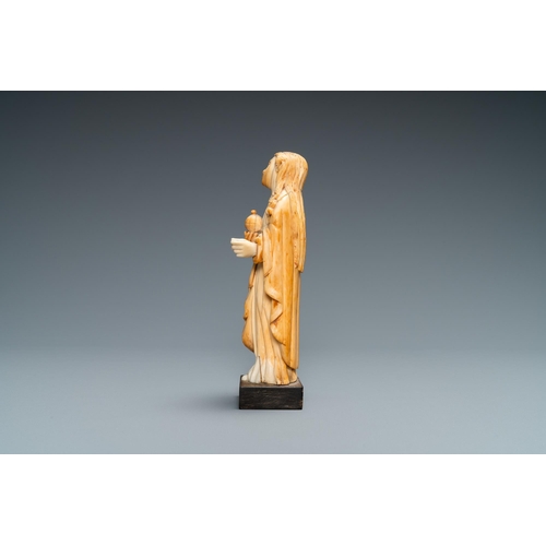 34 - An Indo-Portuguese ivory figure of Mary Magdalen with an ointment jar, probably Goa, 17/18th C.Lot s... 