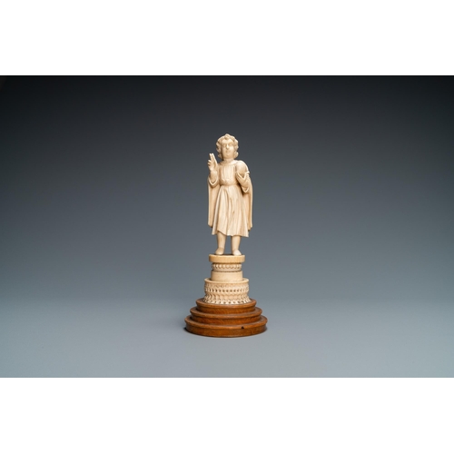 36 - An Indo-Portuguese ivory figure of the Christ Child blessing, probably Goa, 17th C.Lot subject to CI... 