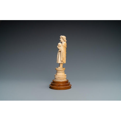 36 - An Indo-Portuguese ivory figure of the Christ Child blessing, probably Goa, 17th C.Lot subject to CI... 