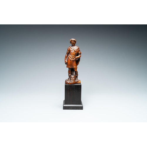 521 - A boxwood figure of David with the head of Goliath, Flanders, 17th C.H.: 29,5 cm (incl. stand)H.: 18... 