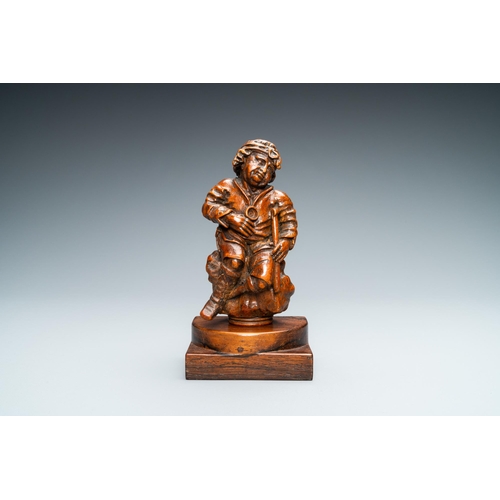 522 - A boxwood figure of a beggar, Flanders, 17/18th C.H.: 15,5 cm (the figure incl. stand)H.: 13 cm (the... 