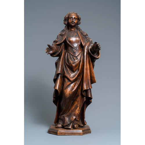 56 - A fruitwood figure of a female saint, Rhine valley, Germany, 2nd half 16th C.H.: 75 cm  Provenance: ... 