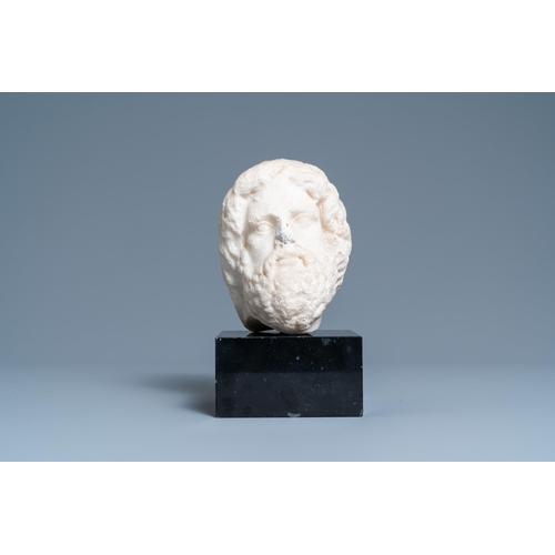 73 - A Roman marble head of a bearded manH.: 25 cm (incl. the base) H.: 17,5 cm (the marble)  Provenance:... 