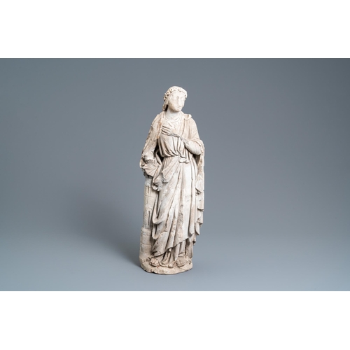 83 - A large limestone figure of Saint Barbara, 16th C.H.: 68,5 cm  Provenance: - The Davioud-Larminet co... 