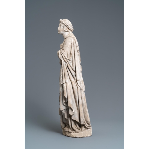 83 - A large limestone figure of Saint Barbara, 16th C.H.: 68,5 cm  Provenance: - The Davioud-Larminet co... 