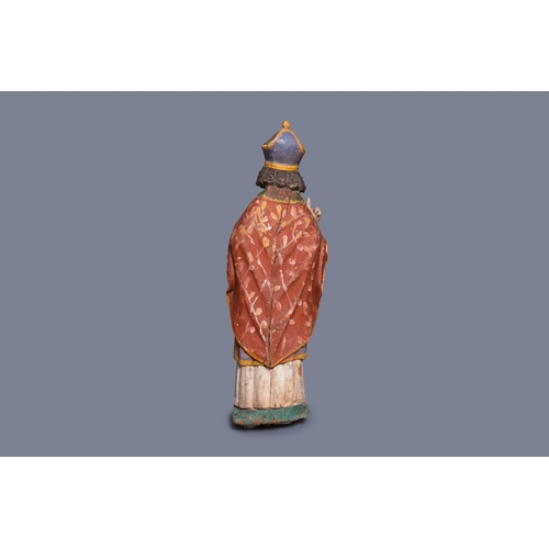 84 - A large polychromed oak figure of a bishop, 16th C.H.: 98 cm  Provenance: - The Davioud-Larminet col... 