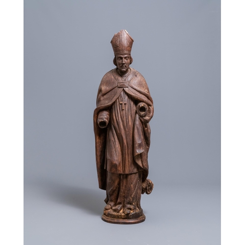 86 - A large limewood figure of a bishop, 18th C.H.: 104 cm  Provenance: - The Davioud-Larminet collectio... 