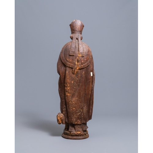 86 - A large limewood figure of a bishop, 18th C.H.: 104 cm  Provenance: - The Davioud-Larminet collectio... 