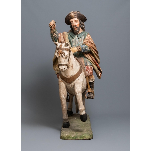 88 - A large polychromed wooden group with Saint James of Compostela on horseback, Spain, 16th C.The Span... 