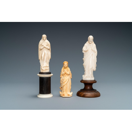 99 - Two figures of Madonna and one of Christ in ivory and bone, 19th C.Lot subject to CITES-regulations.... 