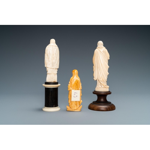 99 - Two figures of Madonna and one of Christ in ivory and bone, 19th C.Lot subject to CITES-regulations.... 