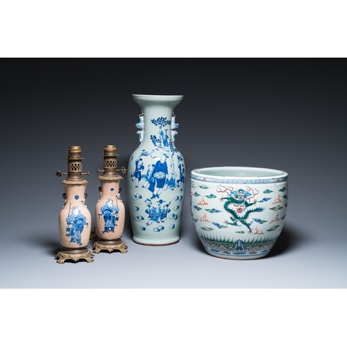 47 - A Chinese blue and white celadon-ground vase, a pair of Nanking vases and a famille verte fish bowl,... 