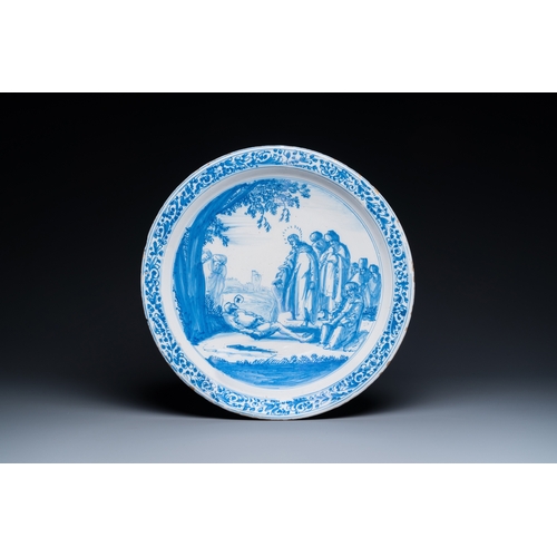 1304 - A fine Dutch Delft blue and white biblical subject dish, 3rd quarter 17th C.Dia.: 37,5 cm
 Ref.:- Ri... 