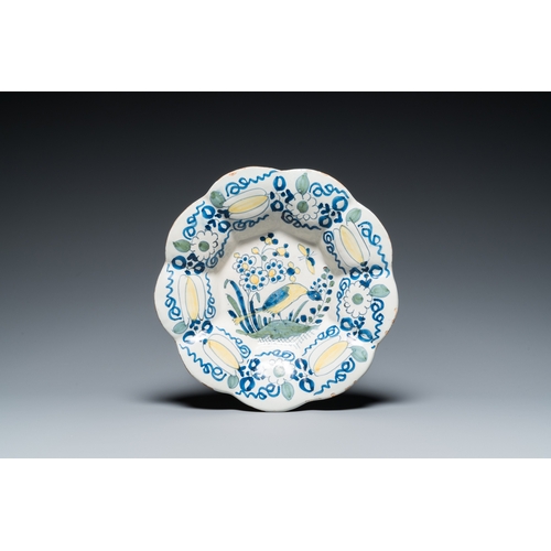 1310 - A polychrome Dutch Delft lobed 'bird' dish, late 17th C.Dia.: 29 cm