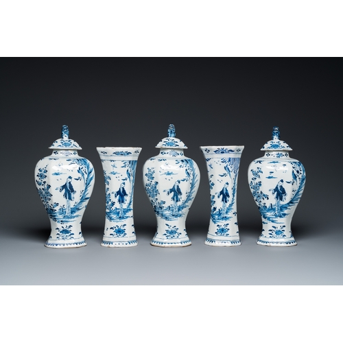 1312 - A Dutch Delft blue and white five-piece chinoiserie garniture, 1st quarter 18th C.H.: 32,5 cm (the t... 