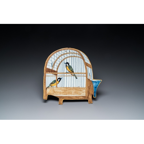 1314 - A rare polychrome Dutch Delft 'birdcage' plaque with two birds, 18th C.Dim.: 33 x 32 cm... 