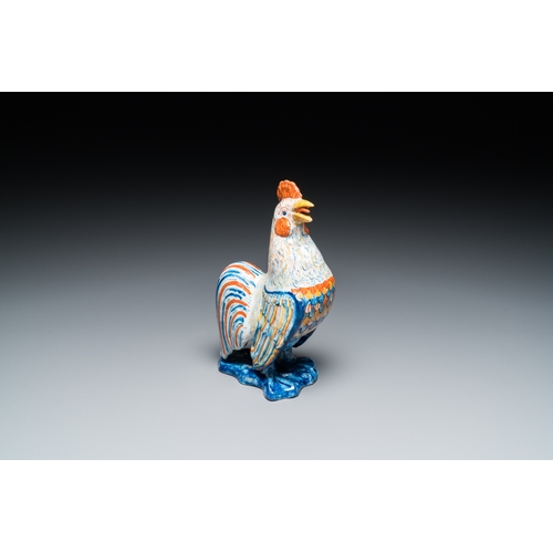 1316 - A fine polychrome Dutch Delft model of a rooster, 18th C.H.: 20,5 cm
 
 The base with an illegible s... 