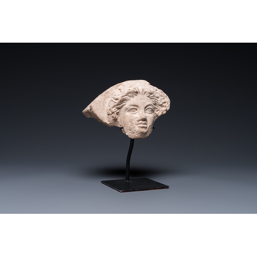 1388 - A Greek terracotta with white engobe antefix in the shape of a woman's head, 5/4th C. b.C.H.: 13 cm ... 