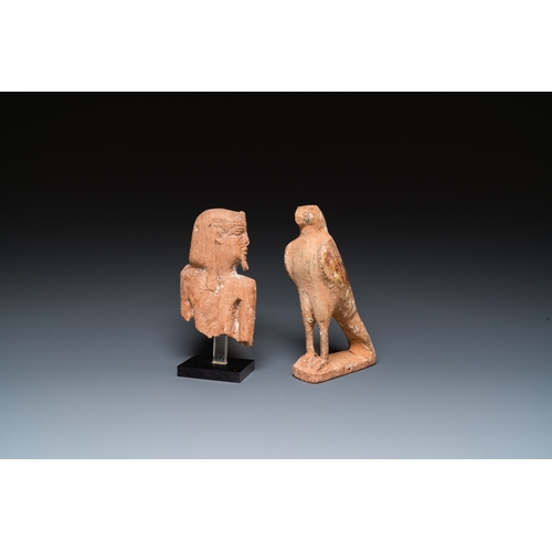 1396 - An Egyptian wooden Horus falcon and a fragment of a farao sculpture, Late PeriodH.: 19 cm
 
 Provena... 