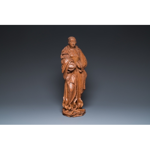 1289 - A Flemish carved oak sculpture of a female saint on a pyre, Brabant region, first half 16th C.H.: 64... 