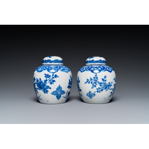 17 - A pair of Chinese Canton famille rose vases and a pair of blue and white covered jars, 19th C.H.: 37... 