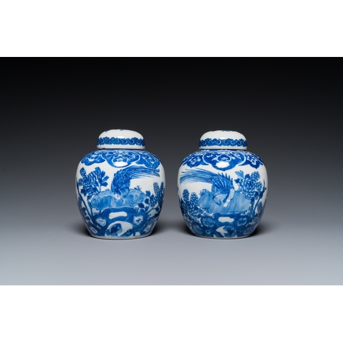 17 - A pair of Chinese Canton famille rose vases and a pair of blue and white covered jars, 19th C.H.: 37... 