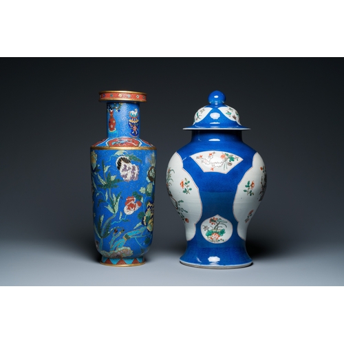 22 - A Chinese famille verte powder-blue-ground vase and a cloisonne rouleau vase, 19th C.H.: 48 cm (the ... 