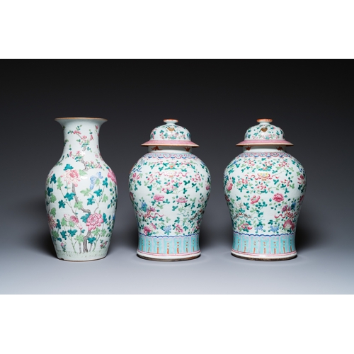 48 - Three Chinese famille rose vases, a hat stand and a blue and white celadon-ground jar and cover, 19t... 