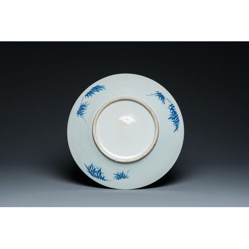 56 - A Chinese blue and white dish and ten plates, 19th C.Dia.: 36,5 cm (the largest)