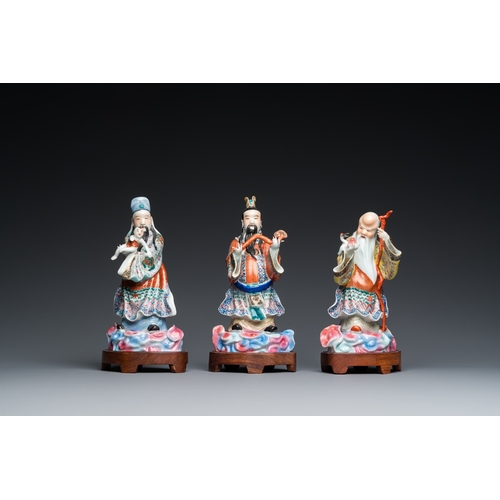 70 - Three Chinese famille rose sculptures of star gods, seal mark, 19/20th C.H.: 24 cm (the tallest incl... 