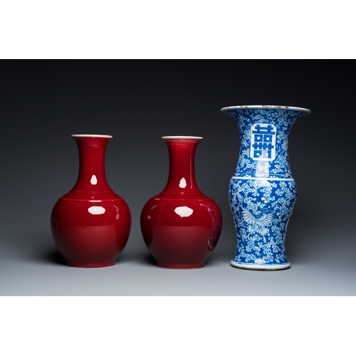 72 - A Chinese blue and white 'Shou' vase with butterflies and a pair of sang-de-boeuf-glazed bottle vase... 